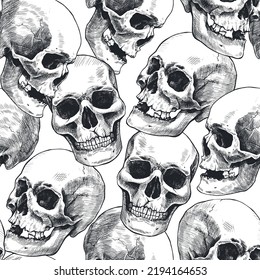 Seamless pattern of hand drawn human skulls. Vector graphic illustration.