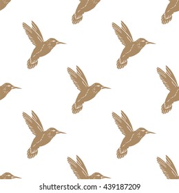 Seamless pattern with hand drawn hummingbird. Vector illustration
