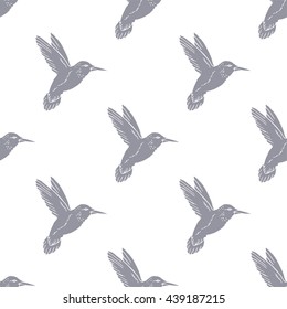 Seamless pattern with hand drawn hummingbird. Vector illustration