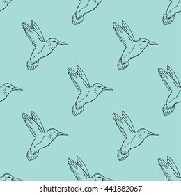 Seamless pattern with hand drawn hummingbird. Vector illustration