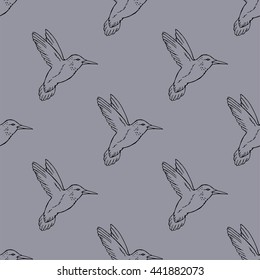 Seamless pattern with hand drawn hummingbird. Vector illustration