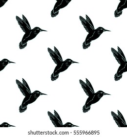 Seamless pattern with hand drawn hummingbird. Vector illustration