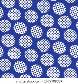 Seamless pattern. Hand drawn imperfect polka dot spot shape background. Monochrome textured dotty delft blue circle all over print swatch