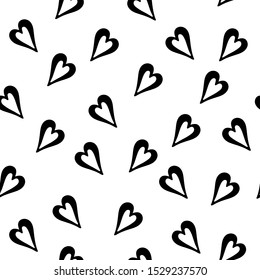 Seamless pattern of hand drawn with ink and brush heart icons.Love and marriage symbol.Wedding engagement Valentine’s day design.Wallpaper textile fabric. Vector illustration black on white background