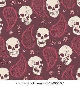 Seamless pattern with hand drawn inky skulls surrounded by paisley. Skeleton heads repeat background.