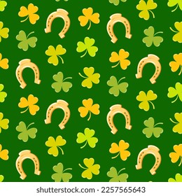 Seamless pattern of hand drawn Irish clover leaves and lucky horse shoe on isolated green background. Design for St. Patrick’s day celebration, party decoration, scrapbooking, home decor, textile.