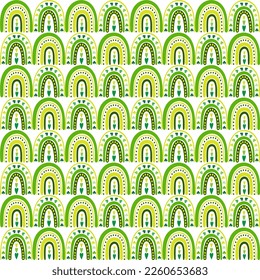 Seamless pattern of hand drawn Irish rainbows, clovers and hearts. Design for St. Patricks day celebration, party decoration, scrapbooking, home decor, textile, print, paper crafts.