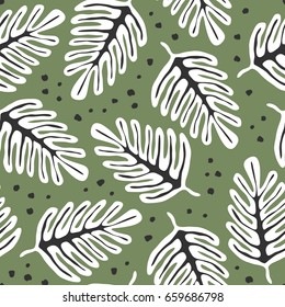 Seamless pattern with hand drawn leaves on green background
