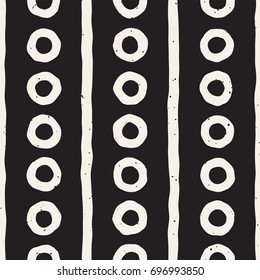 Seamless pattern with hand drawn lines. Abstract background with freehand brush strokes. Black and white grunge texture. Ornament for wrapping paper.