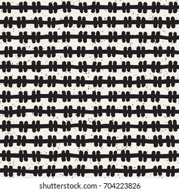 Seamless pattern with hand drawn lines. Abstract background with freehand brush strokes. Black and white grunge texture. Ornament for wrapping paper.