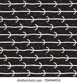 Seamless pattern with hand drawn lines. Abstract background with freehand brush strokes. Black and white grunge texture. Ornament for wrapping paper.