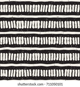 Seamless pattern with hand drawn lines. Abstract background with freehand brush strokes. Black and white grunge texture. Ornament for wrapping paper.