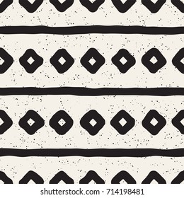 Seamless pattern with hand drawn lines. Abstract background with freehand brush strokes. Black and white grunge texture. Ornament for wrapping paper.