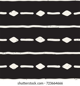 Seamless pattern with hand drawn lines. Abstract background with freehand brush strokes. Black and white texture. Ornament for wrapping paper.