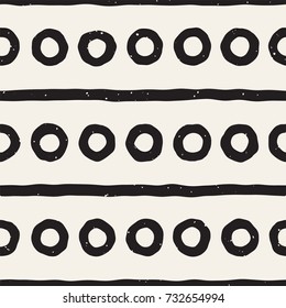 Seamless pattern with hand drawn lines. Abstract background with freehand brush strokes. Black and white grunge texture. Ornament for wrapping paper.