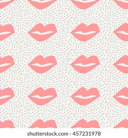 Seamless pattern with hand drawn lips and dots.