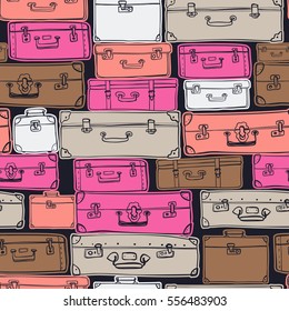 Seamless pattern with hand drawn luggage. Different colorful vintage suitcases on black background.