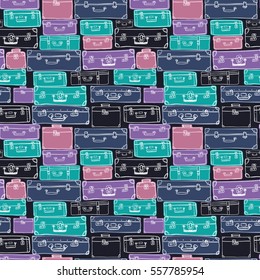 Seamless pattern with hand drawn luggage. Different colorful vintage suitcases on black background.
