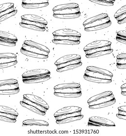 Seamless pattern with hand drawn macaroons. Vector background. 