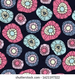 Seamless pattern with hand drawn, magenta-colored, hippyish flowers on black background for surface design and other design projects