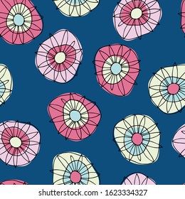 Seamless pattern with hand drawn magenta-colored abstract hippyish flowers on blue background for surface design and other design projects