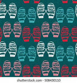 Seamless pattern with hand drawn mittens. Vector holiday endless background