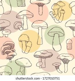 Seamless pattern with hand drawn mushrooms in doodle style 
