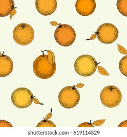 Seamless pattern of hand drawn oranges and slices in sketch style. Vector illustration