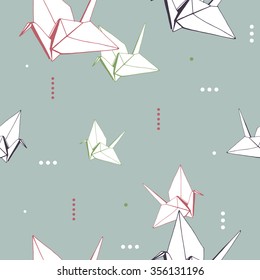 Seamless pattern with hand drawn origami elements. Vector illustration. Decorative texture with paper cranes.
