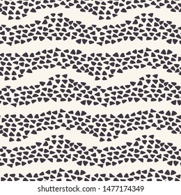 Seamless pattern hand drawn ornamental striped triangle shape background. Irregular wavy allover print. Vector line art swatch
