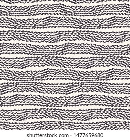 Seamless pattern hand drawn ornamental striped zig zag lines background. Irregular wavy allover print. Vector line art swatch