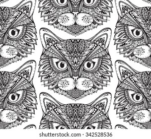 Seamless pattern with hand drawn ornate doodle graphic monochrome cat faces. 