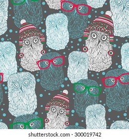Seamless pattern with hand drawn owls in vintage  hats and eyeglasses. Vector repeated background.