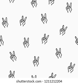 Seamless pattern with hand drawn peace gesture