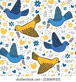 Seamless pattern of hand drawn peace doves in blue and yellow colors. Cute illustration for background, wrapping paper, wallpaper, fabric.