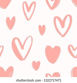 Seamless pattern with hand drawn pink hearts on white background. Decorative backdrop with love, passion and romance symbols. Valentine's day vector illustration for wallpaper, fabric print.