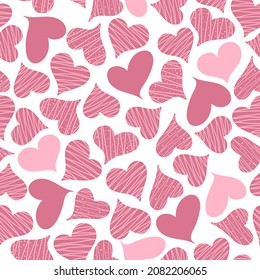  Seamless pattern with hand drawn pink hearts on the white background. Design for fashion, fabric, textile, packaging paper, gift paper and a print on a different product. Happy Valentines day.