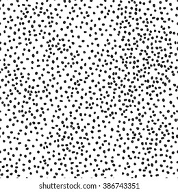 Seamless pattern. Hand drawn polka dot texture vector. Stylish black and white or monochrome doodles. Modern design. Hipster tile print.