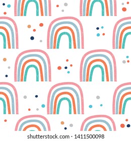 Seamless pattern with hand drawn rainbows. Childish texture for fabric, textile, apparel. Vector background 
