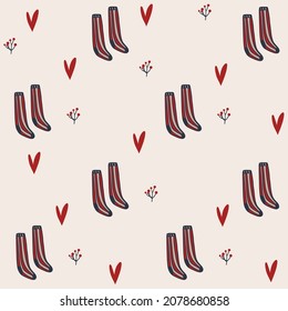 Seamless pattern with hand drawn red socks and hearts. .Cute christmas pattern.