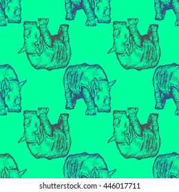 Seamless pattern with hand drawn rhinos, vector illustration