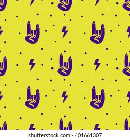 Seamless pattern with hand drawn rock hands and thunderbolts. Ink doodle.