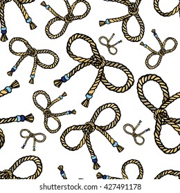 Seamless pattern with hand drawn rope bows