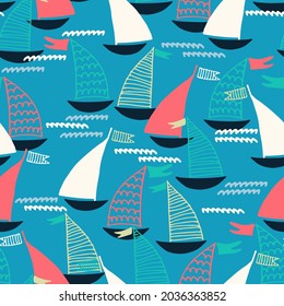 Seamless pattern with hand drawn sailing boats and waves on blue background for surface design and other design projects. Sailing and fishing concept