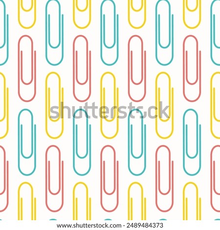 Seamless pattern of hand drawn scattered paper clips on isolated background. Education and office supplies, design for printing, scrapbooking, textile, home or office decor, paper craft. 