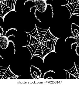 Seamless pattern, hand drawn set of halloween attributes, white webs and spiders on a black background