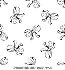 Seamless pattern of hand drawn sketch style bows. Vector illustration isolated on white background