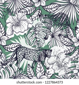 Seamless pattern of hand drawn sketch style exotic flowers, plants and leopards. Vector illustration.