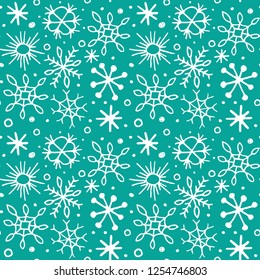 Seamless pattern with hand drawn sketch snowflakes. Vector illustration.