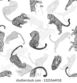 Seamless pattern of hand drawn sketch style leopards isolated on white background. Vector illustration.